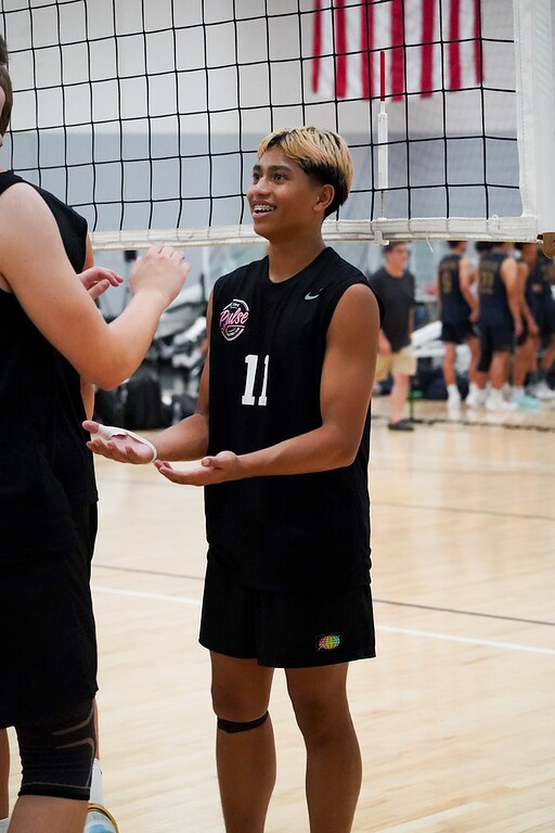 Josh smiling with a teammate